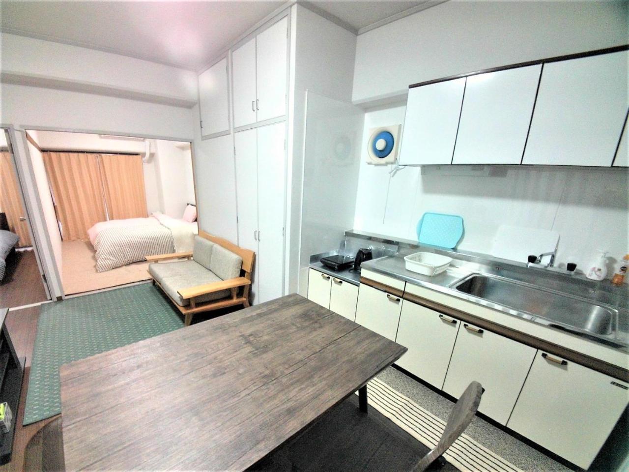 Near Tram Apartment Okayama Buitenkant foto