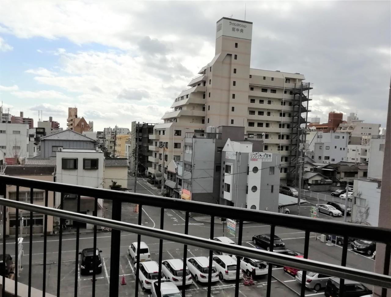 Near Tram Apartment Okayama Buitenkant foto