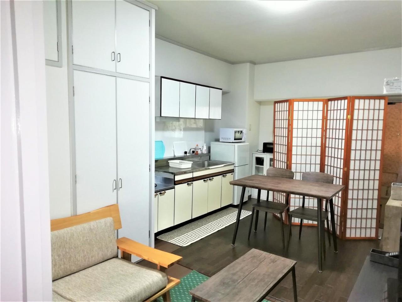 Near Tram Apartment Okayama Buitenkant foto